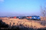 CR, Conrail GP35 2336 -BAR GP9 76 -CR U25B 2676- 2682, with eastbound IHCR-3, on the ex-ERIE mainline across the meadowlands at East Rutherford, New Jersey. December 2, 1979.  